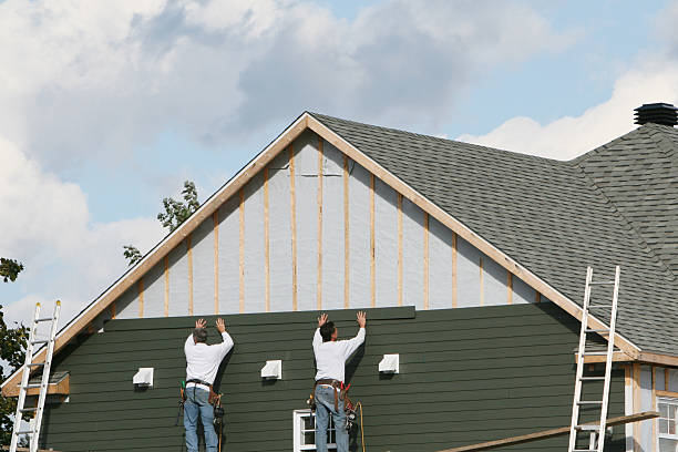 Professional Siding Replacement technician working in North Beach, MD